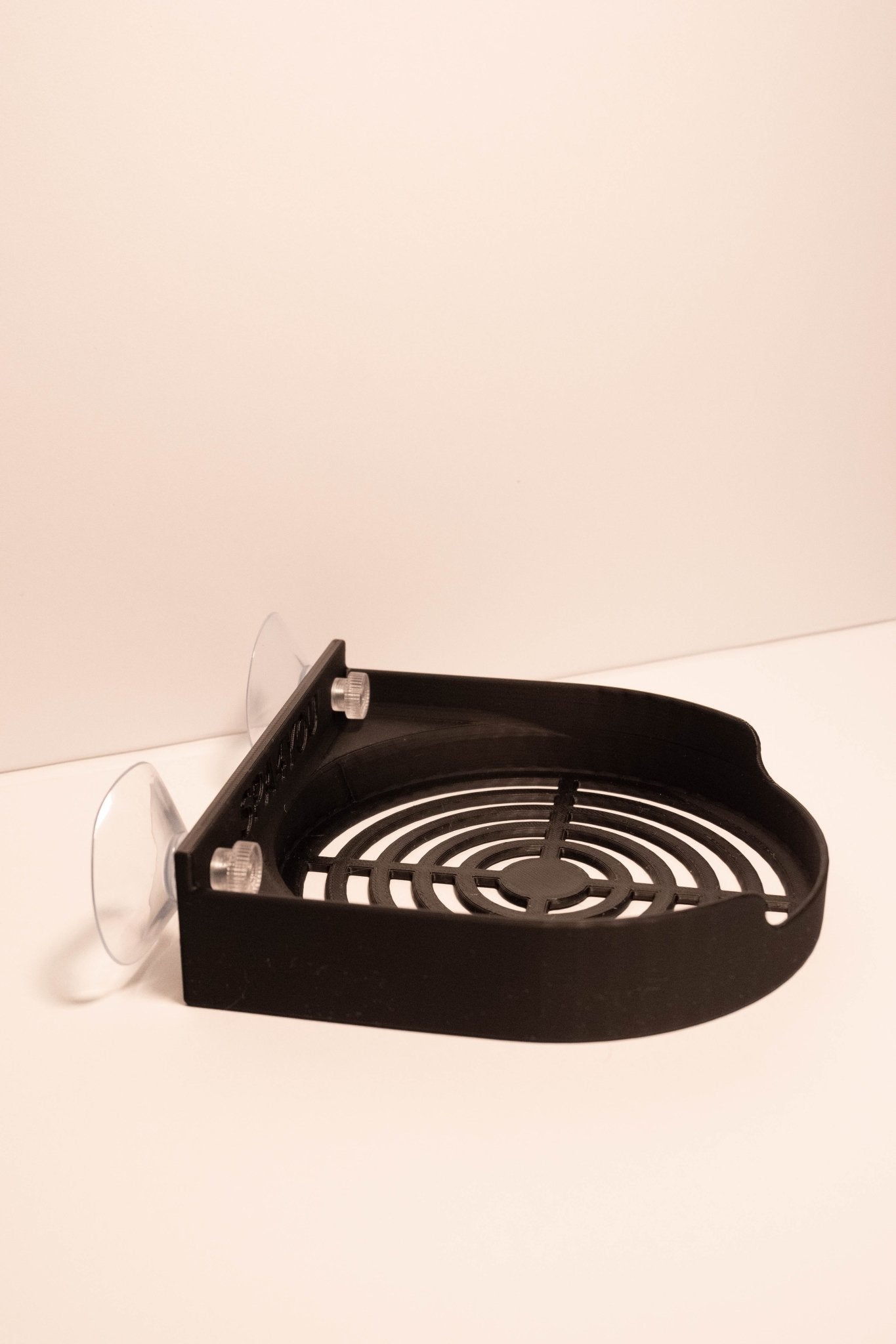 Kempinės laikiklis su siurbtukais