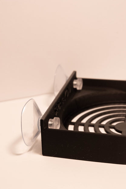 Kempinės laikiklis su siurbtukais